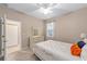 Bedroom featuring neutral walls, carpeted floors and natural light at 9839 Sw 99Th Loop, Ocala, FL 34481