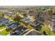 An aerial view of a planned community with manicured lawns and tree-lined streets at 11569 Sw 71St Cir, Ocala, FL 34476