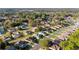 Overhead shot showcasing homes in a quiet residential area with mature trees and green spaces at 11569 Sw 71St Cir, Ocala, FL 34476