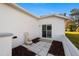 Tiled back patio with a decorative fountain, perfect for relaxation and outdoor enjoyment at 11569 Sw 71St Cir, Ocala, FL 34476