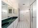 Bathroom featuring a double-sink vanity, white cabinets, and a separate shower and tub at 11569 Sw 71St Cir, Ocala, FL 34476