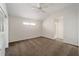 Bright bedroom with vaulted ceiling, neutral carpet, and large window providing natural light at 11569 Sw 71St Cir, Ocala, FL 34476