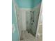 Bright shower stall, clear glass door, and built-in shelves at 11663 Sw 72Nd Cir, Ocala, FL 34476