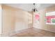 Cozy dining room with tile floors and two large windows at 1225 Se 16Th St, Ocala, FL 34471