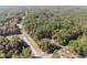 Aerial view of home situated within a dense forest at 18301 Sw 69Th Loop, Dunnellon, FL 34432