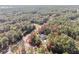 Aerial view of home on large wooded lot at 18301 Sw 69Th Loop, Dunnellon, FL 34432