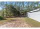 View of wooded property, home and backyard at 18301 Sw 69Th Loop, Dunnellon, FL 34432