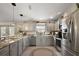 Well-lit kitchen featuring stainless steel appliances and granite countertops at 1986 Altamonte Way, The Villages, FL 32162