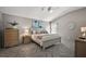 Comfortable main bedroom featuring vaulted ceiling, ceiling fan, and neutral decor at 1986 Altamonte Way, The Villages, FL 32162