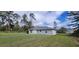 Image showcases the property's fenced yard and shed at 3326 Sw 128Th Street Rd, Ocala, FL 34473