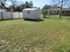 Backyard of property with a shed at 3900 Sw 147Th Lane Rd, Ocala, FL 34473