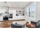 Bright kitchen with white cabinetry, stainless steel appliances, and stylish coffee bar area at 4731 Se 32Nd St, Ocala, FL 34480