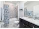 Well-maintained bathroom featuring a shower-over-tub, a toilet, and a vanity with storage at 5370 Sw 45Th Ave, Ocala, FL 34474