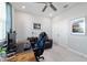 Comfortable office space featuring modern desk setup, a cozy chair, and ample storage at 5370 Sw 45Th Ave, Ocala, FL 34474