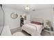 Bedroom features neutral colors, carpet, and ceiling light at 6213 Sw 97Th St, Ocala, FL 34476