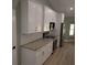 Newly remodeled kitchen with white cabinets, granite countertops, and stainless steel appliances at 8303 Sw 127 Ave, Dunnellon, FL 34432