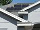 Close up of solar panels on roof and the roof's architecture at 8504 Sw 84Th Loop, Ocala, FL 34481