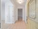 Bright entryway with tile flooring, leading to various rooms with natural light at 8669 Sw 88Th Loop, Ocala, FL 34481