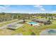 Aerial view of community pool with a recreational area, perfect for leisure at 8973 Sw 104Th Pl, Ocala, FL 34481