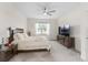 Bedroom featuring neutral walls, ceiling fan and view from window at 9238 Sw 60Th Terrace Rd, Ocala, FL 34476