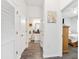 Hallway view, showing bathroom, bedroom, and closet with white trim doors at 9238 Sw 60Th Terrace Rd, Ocala, FL 34476