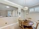 Dining area with a view of the kitchen and entry foyer at 9480 Sw 76Th St, Ocala, FL 34481