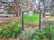 Wyomina Park sign featuring lush greenery, inviting atmosphere, and neighborhood charm at 1022 Ne 11Th Ave, Ocala, FL 34470