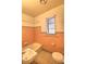 Cozy bathroom featuring a combination tub and shower, and essential fixtures at 1034 Ne 11Th St, Ocala, FL 34470