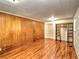Bedroom with a view, featuring wood-look flooring and a large closet at 1034 Ne 11Th St, Ocala, FL 34470