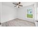 Bedroom featuring natural light, ceiling fan, and new flooring at 107 Sw Alvarez Rd, Dunnellon, FL 34431