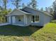 Charming single-Gathering home with a two-car garage and a well-manicured lawn at 107 Sw Alvarez Rd, Dunnellon, FL 34431