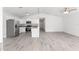 Open floor plan kitchen with stainless steel appliances and granite countertops at 107 Sw Alvarez Rd, Dunnellon, FL 34431
