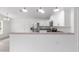 Open kitchen with granite countertops and stainless steel appliances at 107 Sw Alvarez Rd, Dunnellon, FL 34431