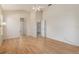 Bedroom with neutral colored walls and hardwood flooring at 11587 Sw 72Nd Cir, Ocala, FL 34476