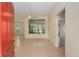 Open foyer featuring light wood floors, bright natural light, and a view into living areas at 11587 Sw 72Nd Cir, Ocala, FL 34476