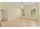 Well-lit living room with fan and high ceilings offering lots of natural light at 11587 Sw 72Nd Cir, Ocala, FL 34476