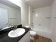 Well-lit bathroom featuring granite counters and modern vanity at 13042 Sw 60Th Court Rd, Ocala, FL 34473