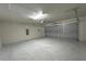 Open garage with ample space for parking and storage at 13042 Sw 60Th Court Rd, Ocala, FL 34473