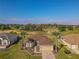 Lovely home with lush green surroundings and a pristine golf course view at 13128 Se 97Th Terrace Rd, Summerfield, FL 34491