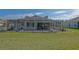 Spacious yard with screened in patio and mature landscaping at 13128 Se 97Th Terrace Rd, Summerfield, FL 34491