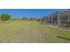 Expansive backyard with golf course views, perfect for enjoying the outdoors at 13128 Se 97Th Terrace Rd, Summerfield, FL 34491