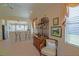 Charming dining area with decorative hutch and bar seating to the kitchen at 13128 Se 97Th Terrace Rd, Summerfield, FL 34491