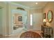 Foyer leads to a cozy room with lots of natural light, plush seating and french doors at 13128 Se 97Th Terrace Rd, Summerfield, FL 34491