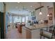 Bright kitchen with granite countertops and stainless steel appliances at 13128 Se 97Th Terrace Rd, Summerfield, FL 34491