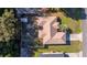 Aerial view of a single-story home with a large backyard and mature trees at 14059 Sw 47Th Ave, Ocala, FL 34473