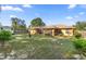 Spacious backyard featuring a well-maintained lawn, shed, and outdoor area, perfect for outdoor enjoyment at 14059 Sw 47Th Ave, Ocala, FL 34473