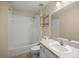 Clean and functional bathroom featuring a shower-tub combo and a single-sink vanity at 14059 Sw 47Th Ave, Ocala, FL 34473