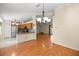 Eat-in kitchen adjacent to a living room and featuring stainless steel appliances at 14059 Sw 47Th Ave, Ocala, FL 34473