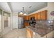 Well-appointed kitchen featuring stainless steel appliances and granite countertops at 14059 Sw 47Th Ave, Ocala, FL 34473