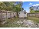 Backyard shed providing extra storage and organization solutions, perfect for home maintenance at 14059 Sw 47Th Ave, Ocala, FL 34473